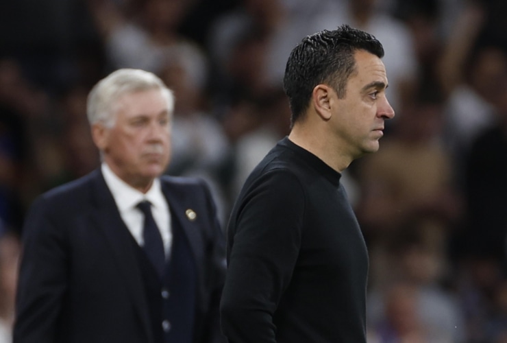 Carlo Ancelotti e Xavi durante il Clasico - Foto ANSA - Ilromanista.it